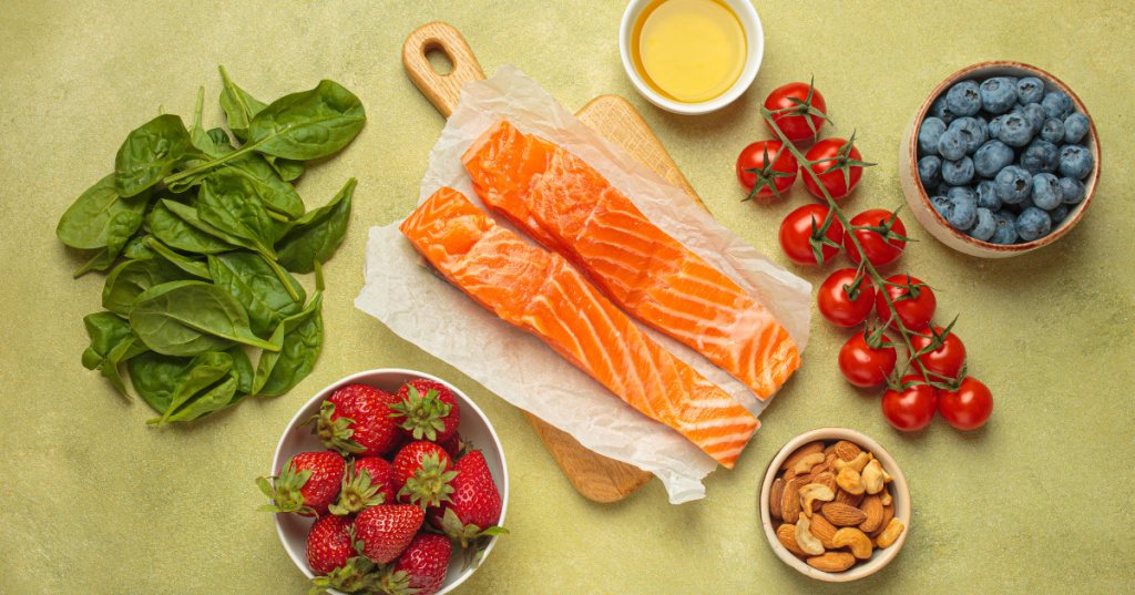 anti inflammatory foods including salmon, strawberries and tomatoes.